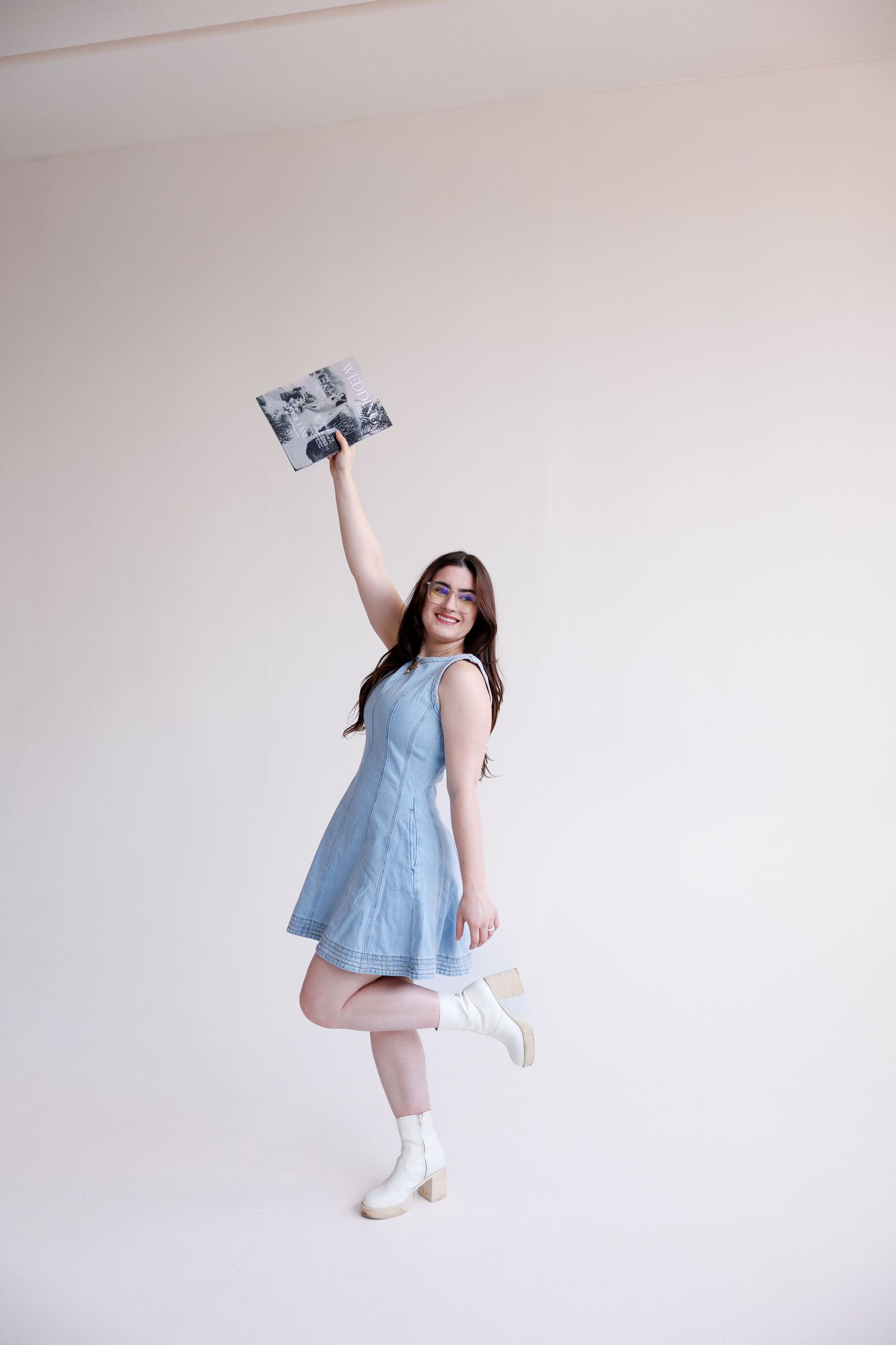 Urban rooftop portraits featuring casual poses against city skyline backdrop.