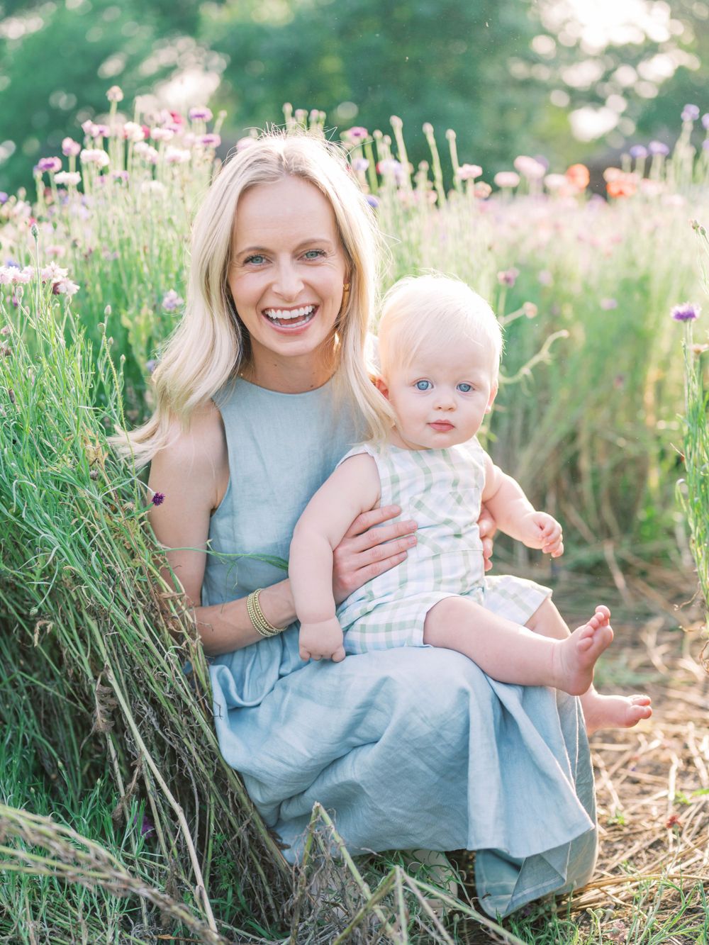 wildflower petite session of mother and baby boy in the wildflowers