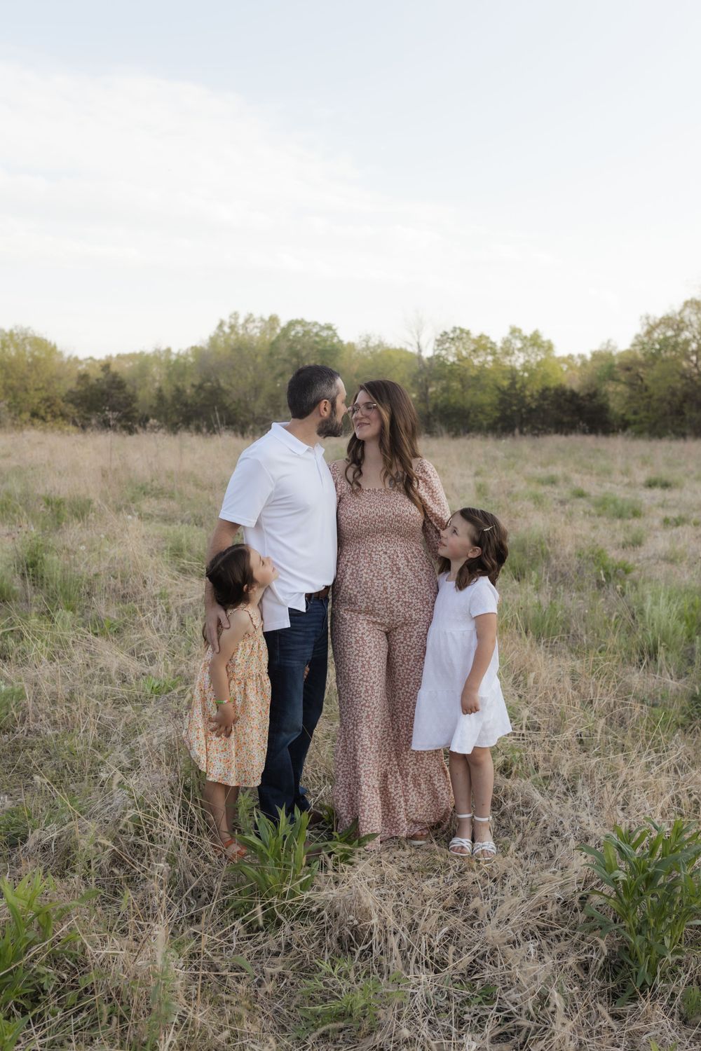 Family photos in a field of in Columbia Missouri photographer