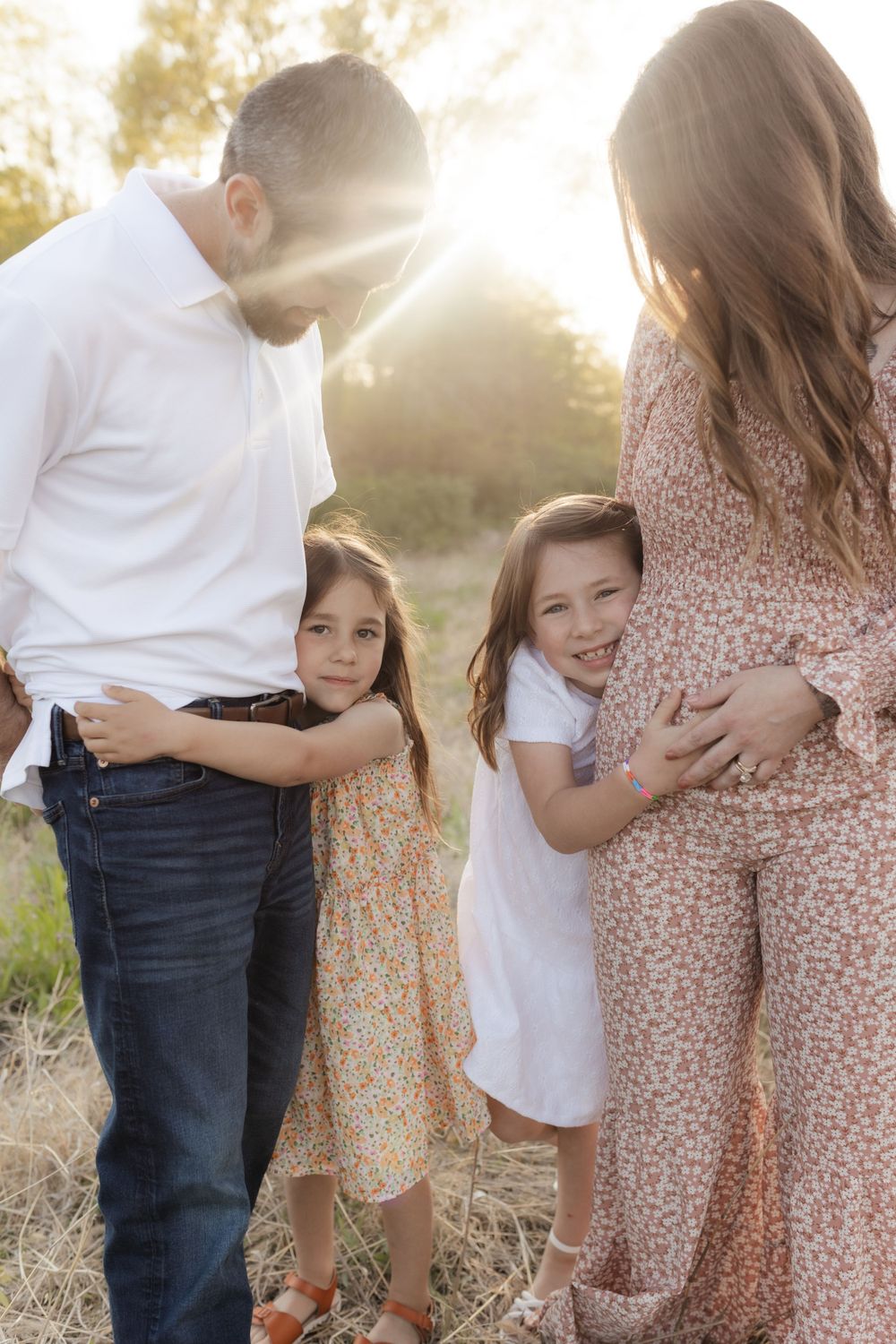 Family photos in a field of in Columbia Missouri photographer