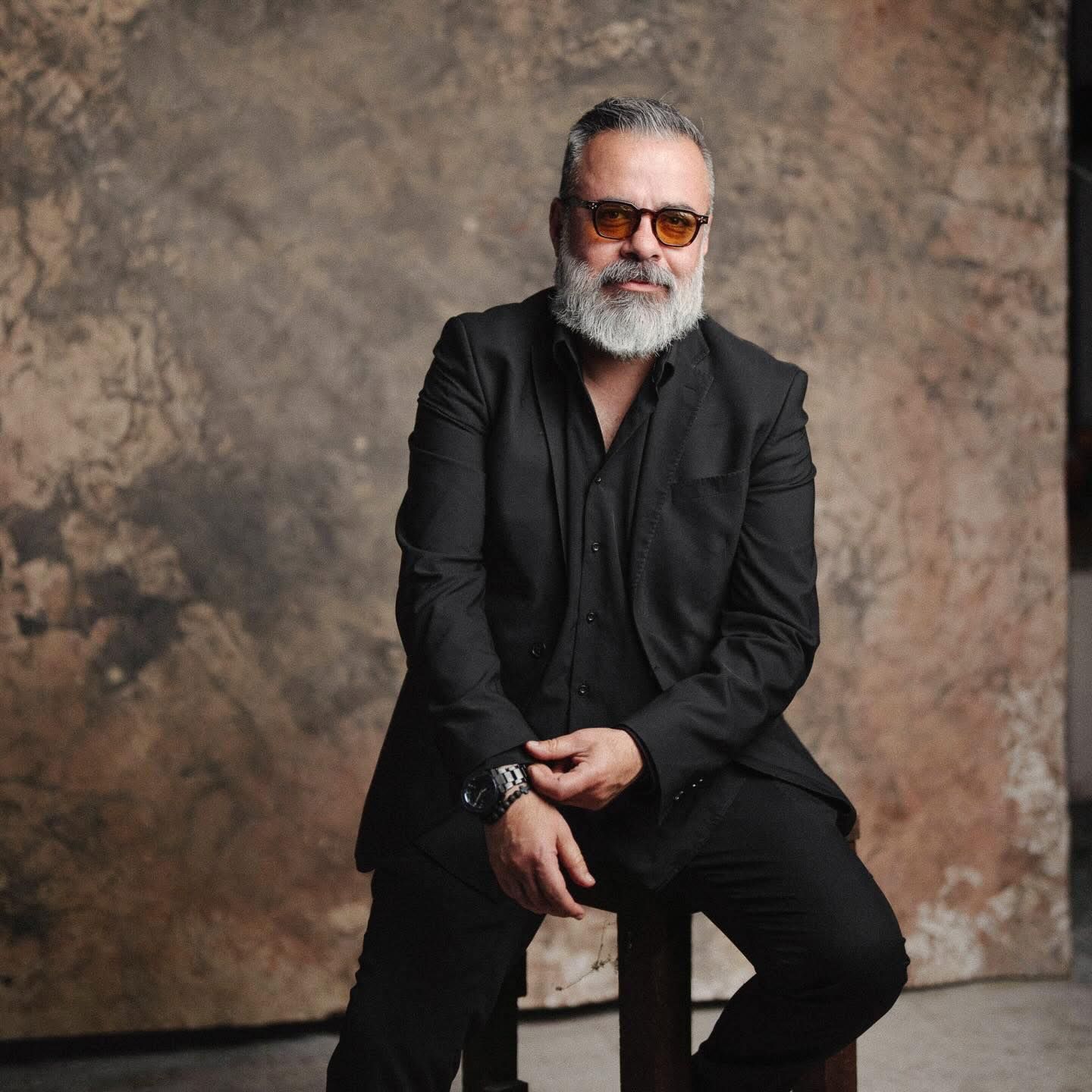 Portrait of Memo Márquez, destination wedding photographer, documenting a wedding in Oaxaca, Mexico.