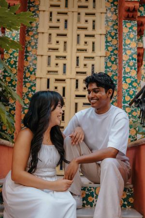 Couple embracing near Casa Vicens historic facade