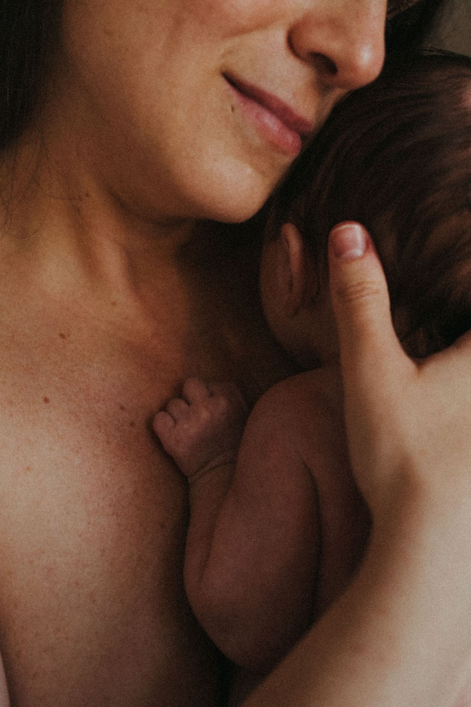 Artistic close-up series capturing tender moments in warm, intimate lighting.