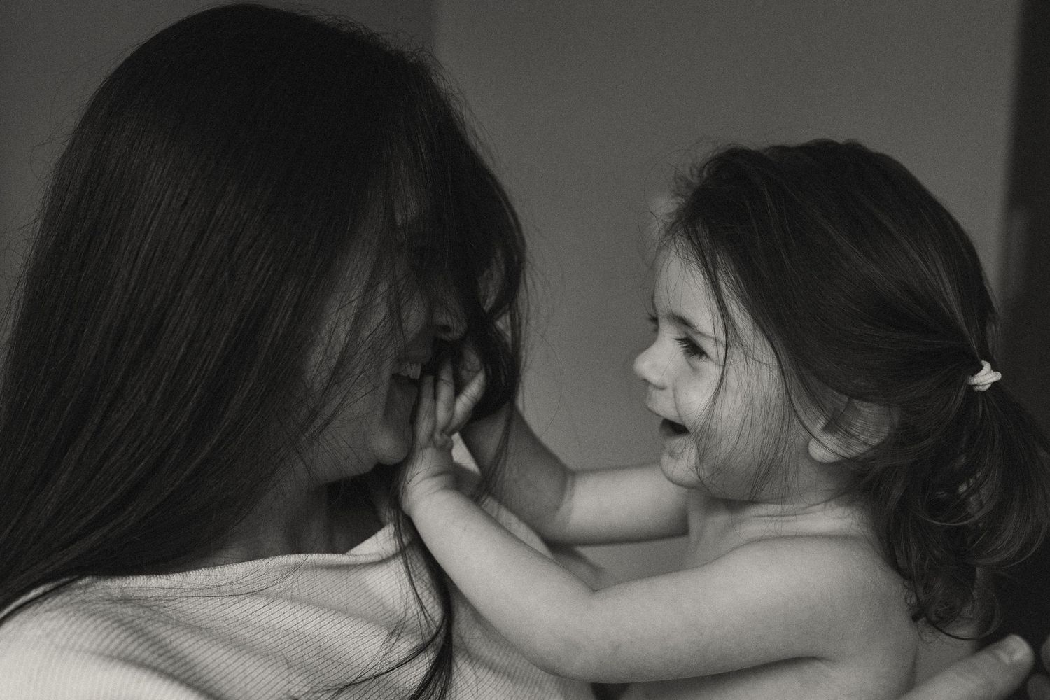 Sequence of intimate black and white portraits showing connection and emotion.