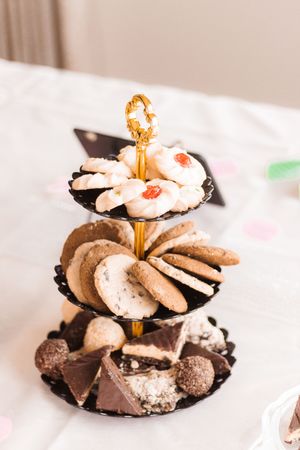 A picture of different types of biscuits and chocolates.