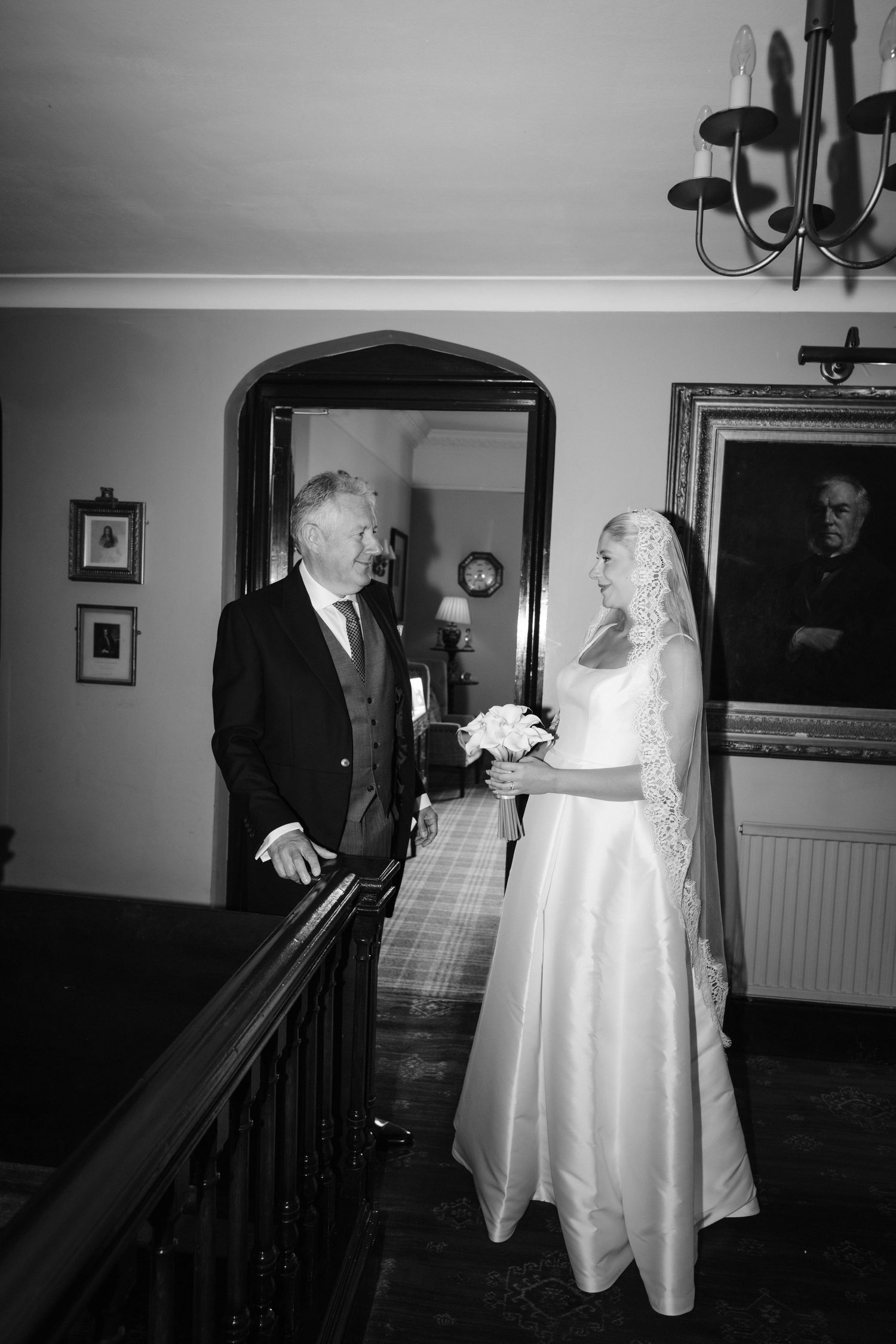 bride and groom walking in golden hour light at wedding in West Green gardens Hampshire