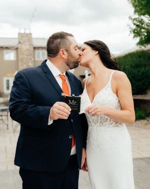 Romantic sequence of wedding couple sharing a playful kiss outdoors.