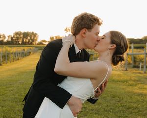 Golden hour wedding photos showing tender moments between newlyweds in a countryside setting.