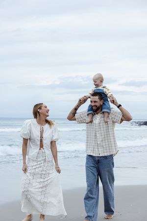 Coastal family photography with soft tones and candid storytelling