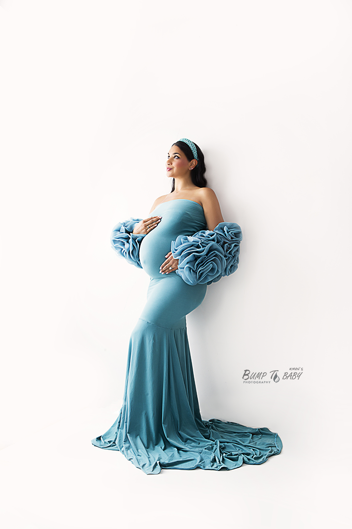 Professional maternity photography session in Croydon Melbourne with soft backdrop