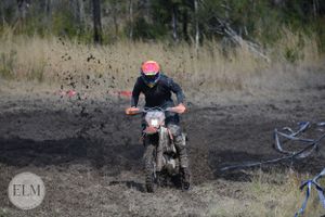 Motorbike flicking up dust