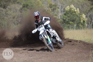 Motorbike flicking up dust