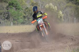 Motorbike flicking up dust