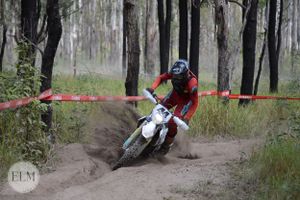 Motorbike flicking up dust