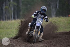 Motorbike flicking up dust