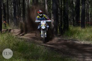Motorbike flicking up dust