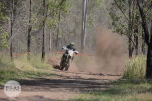 Motorbike flicking up dust