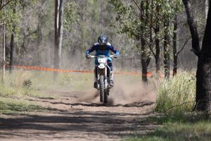 Motorbike flicking up dust