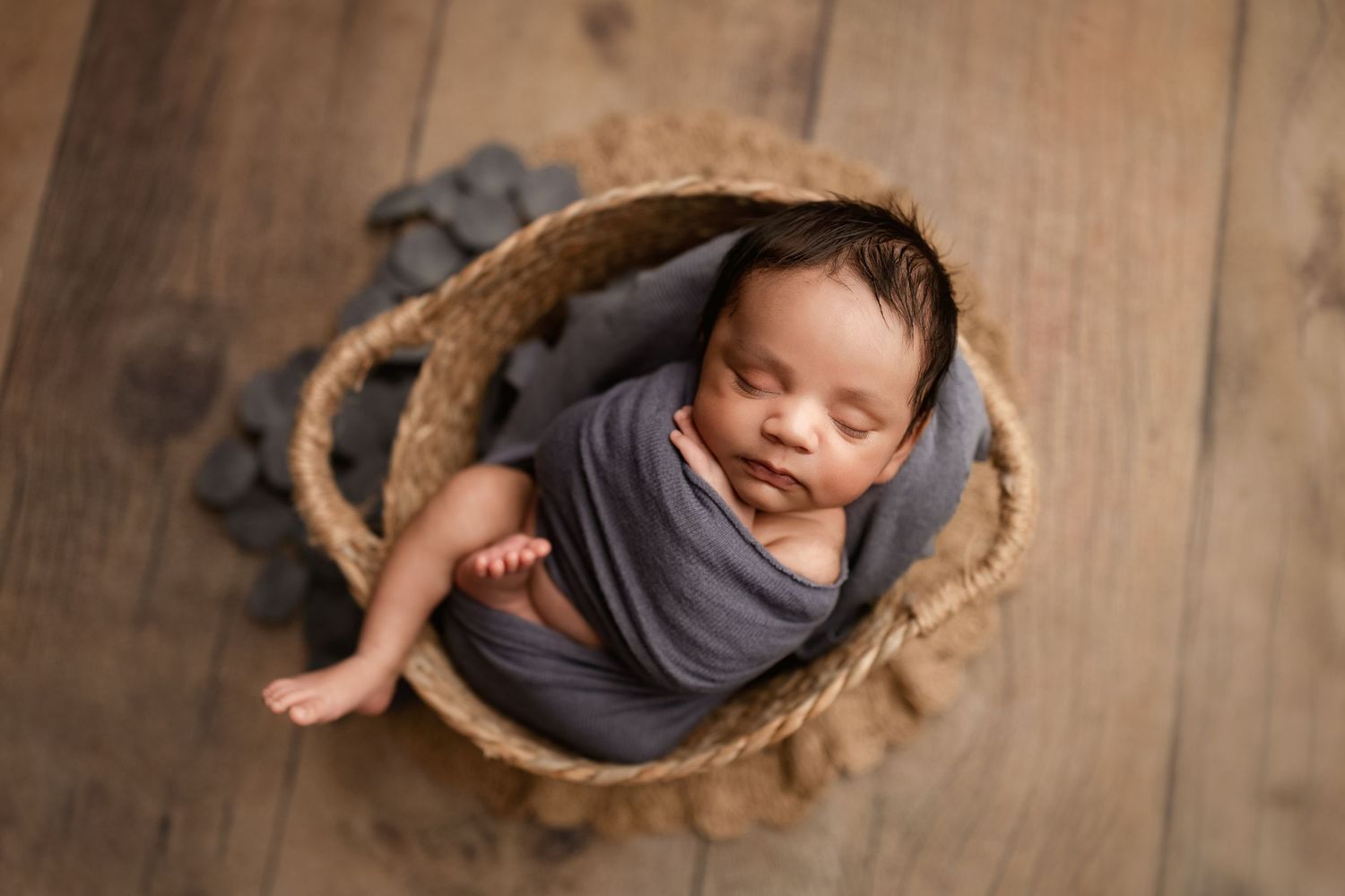 Newborn photography in Magnolia TX featuring timeless posed newborn portraits in a neutral studio setting