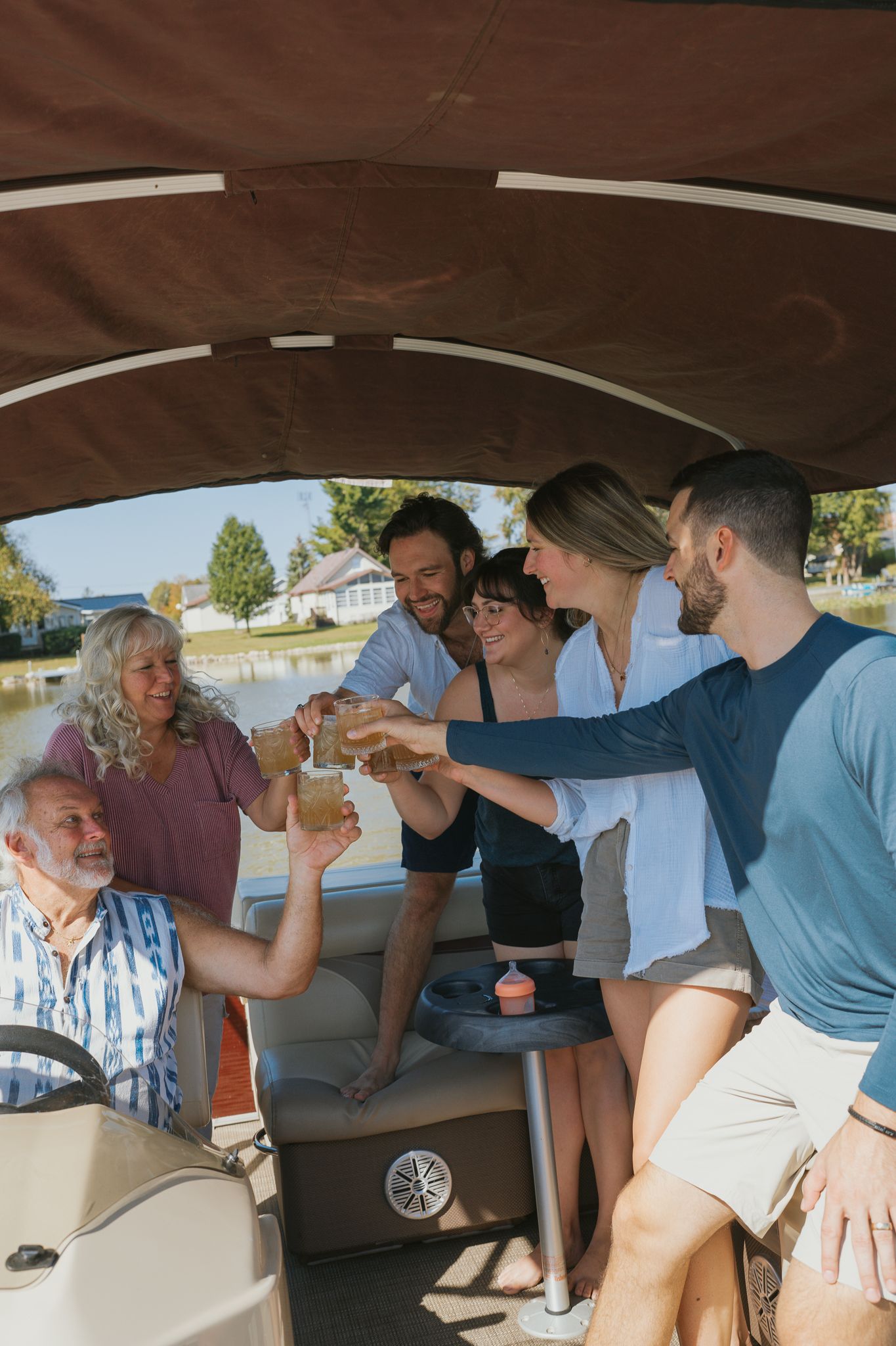Family photographed on a boat in Muskegon MI