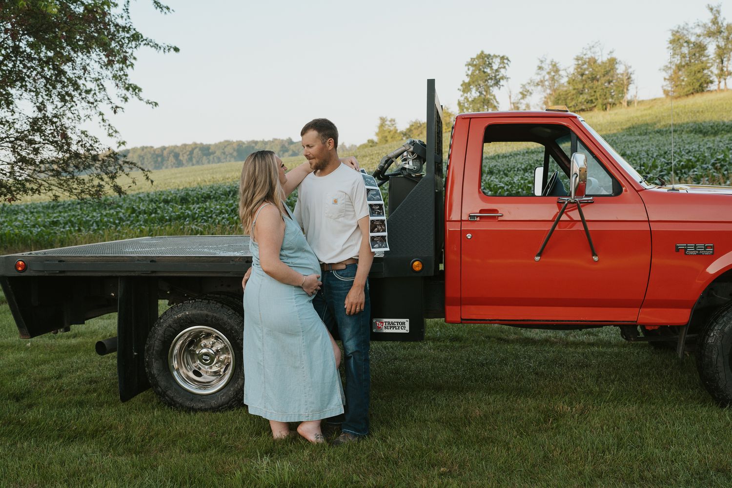 A series of romantic engagement photos taken at sunset featuring a couple posing near a vintage red pickup truck in a rural setting.