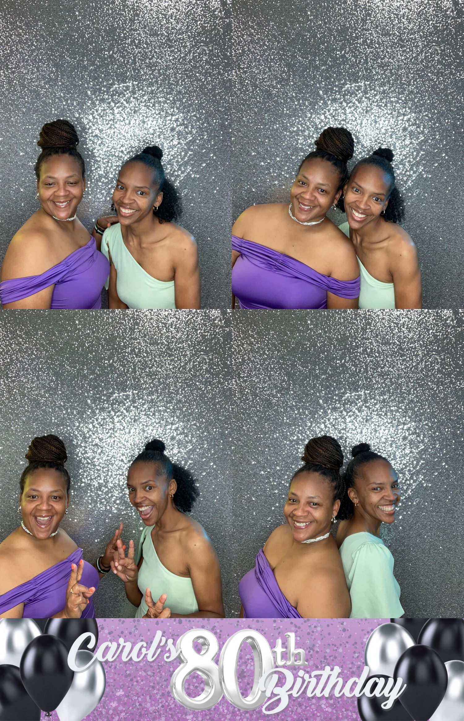 Two people posing in a photo booth with purple and mint green dresses against a silver sparkly backdrop at Carol's 80th birthday.
