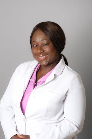 Professional wearing a crisp white blazer and pink top poses against a light gray background in multiple headshots.