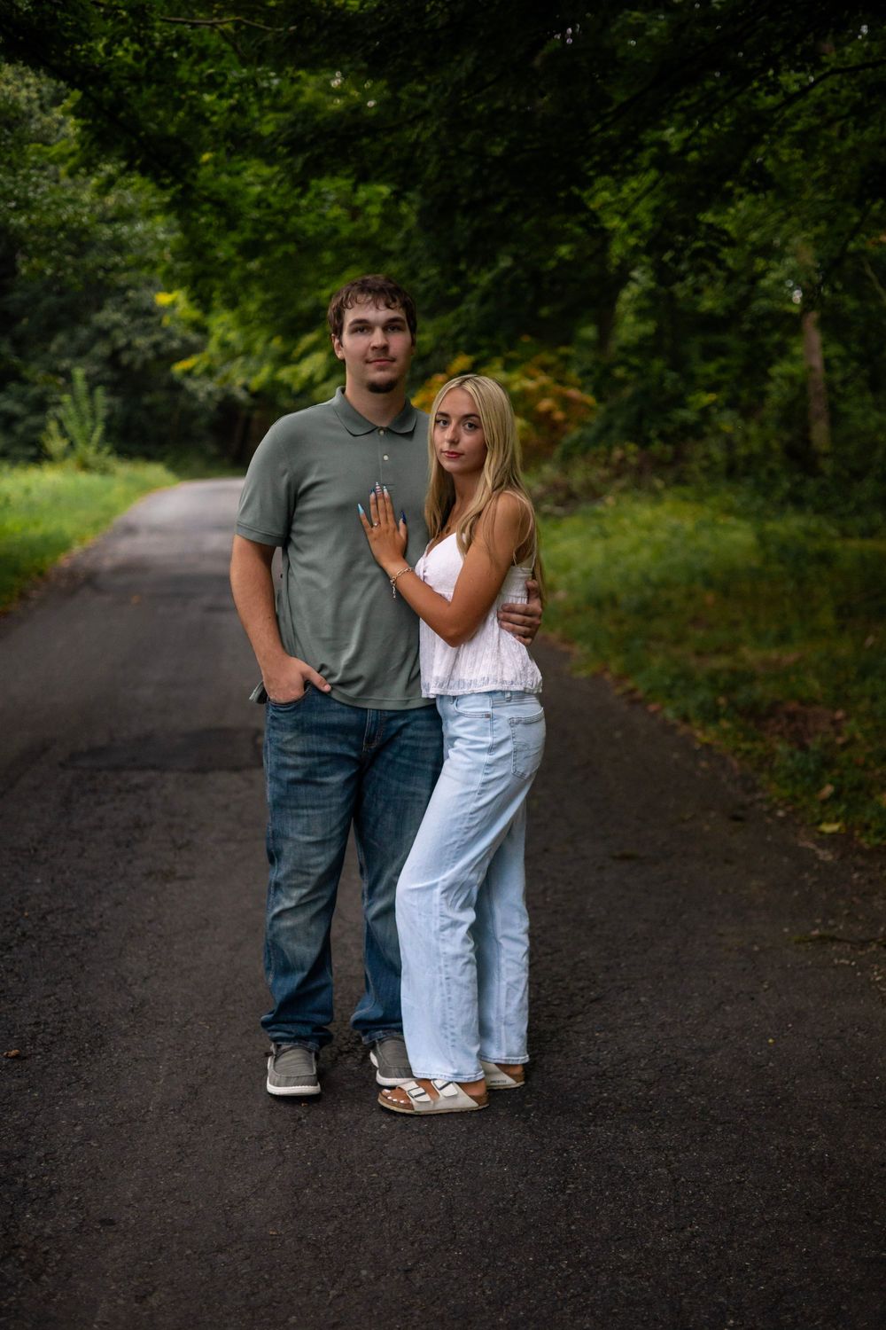 Portrait of a couple on a quiet road in Western, MA