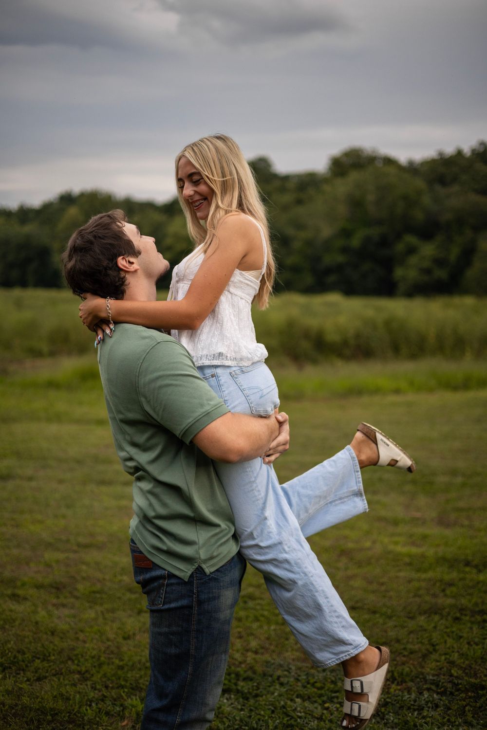 Candid portrait of a couple having fun and dancing in Western Massachusetts