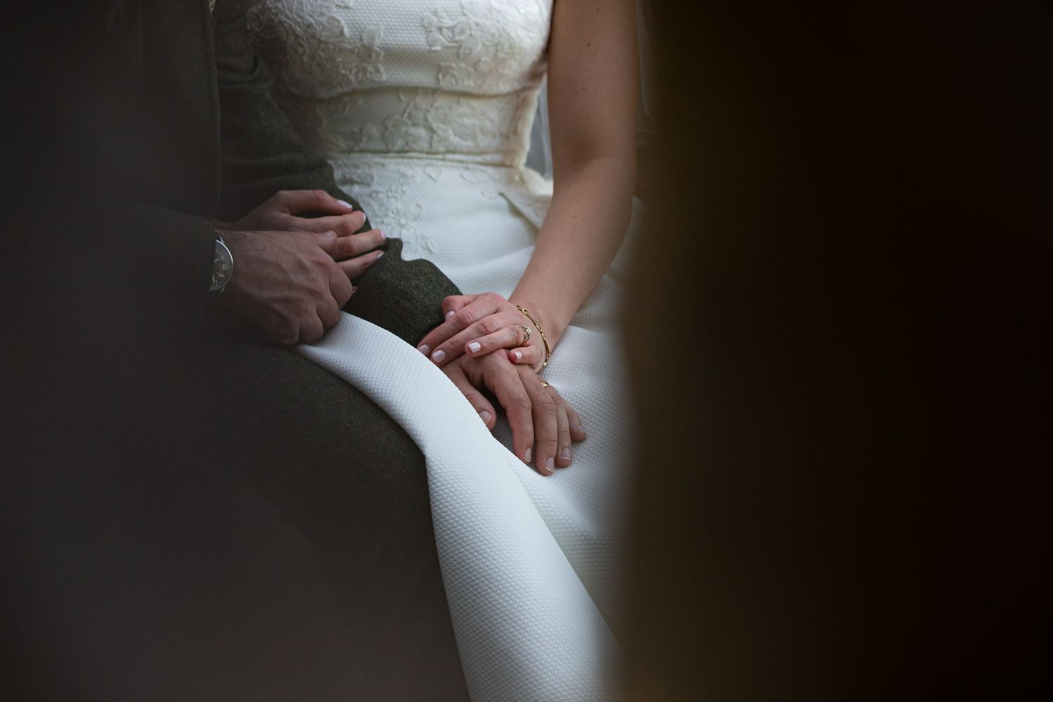 bride-groom-wedding-rings-sitting-mitton-hall-lancashire-jane-ball-photography