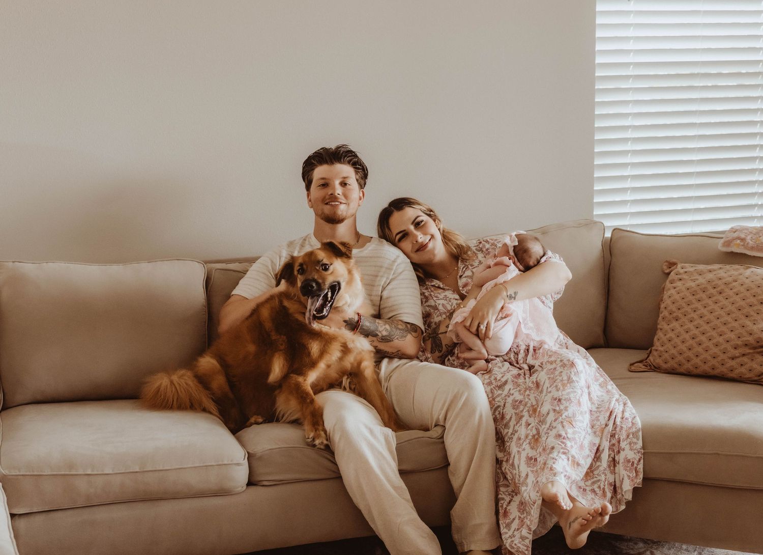 newborn family phot with dog