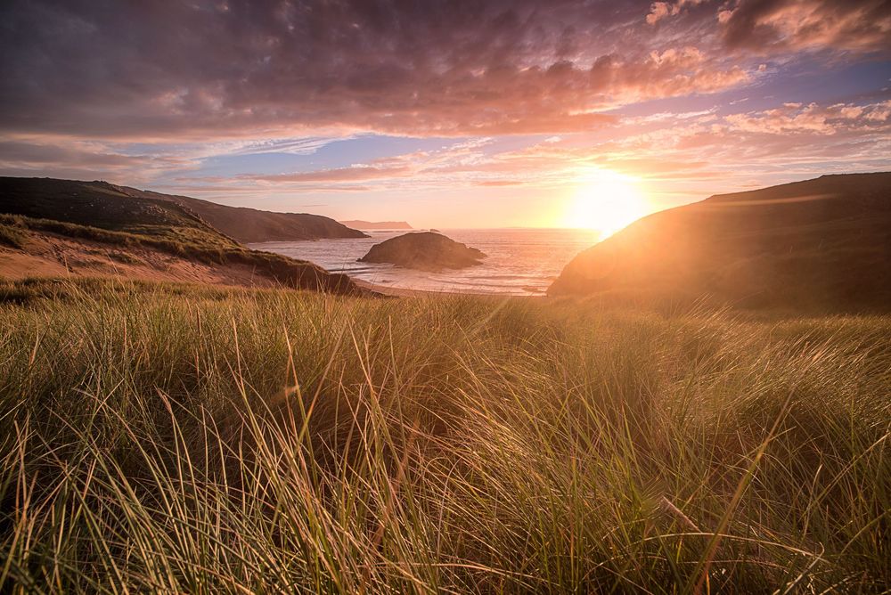 Tramonto sulle dune sabbiose di Murder Hole Beach