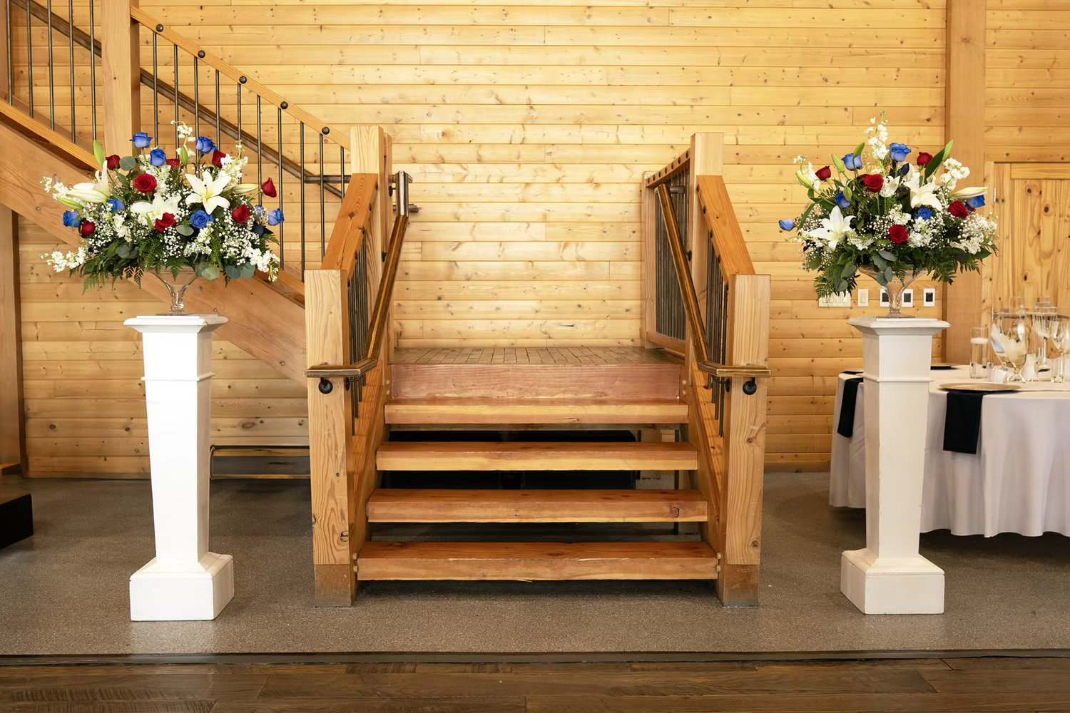 Wooden staircase flanked in Stone Valley Meadows venue