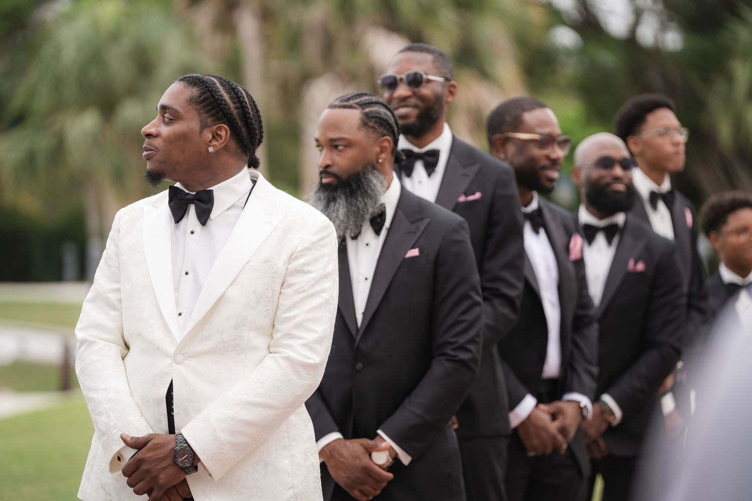 Groom and groomsmen during a ceremony at the Mansion at Tuckahoe