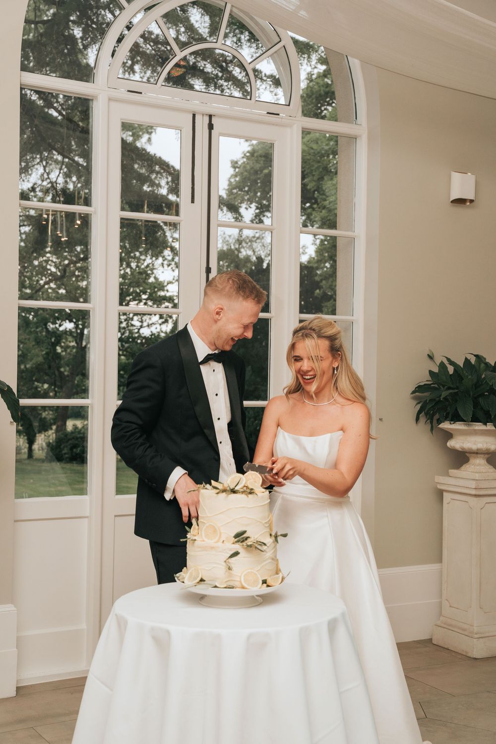 Bride and Groom cutting their cake at Deer Park Country House