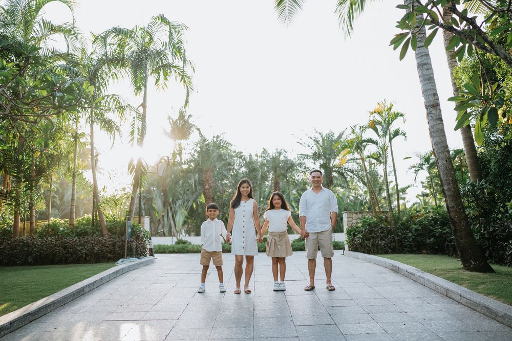 Happy family portrait at The Mulia Bali Nusa Dua