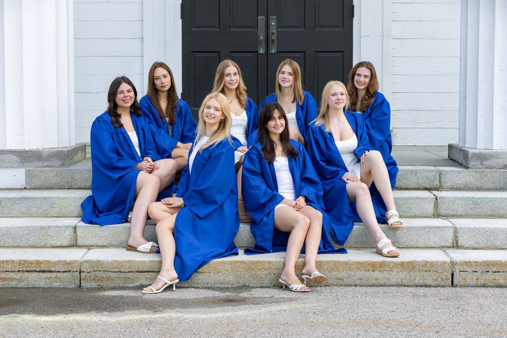 Lincoln Sudbury graduate friends pose on steps during cap & gown senior portraits. Weston High, Wayland, Concord Carlisle