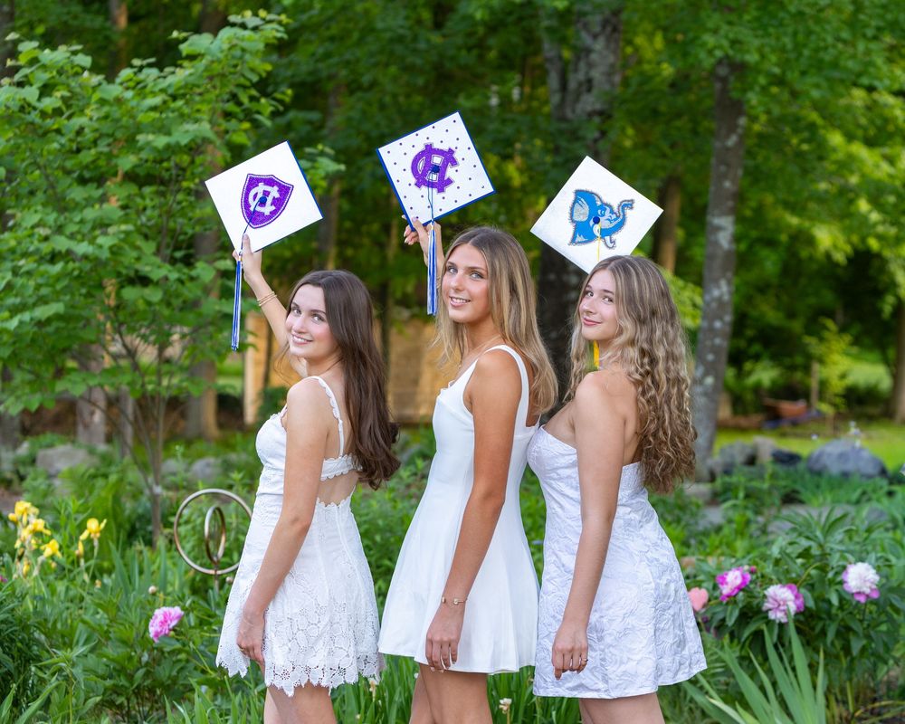 Lincoln Sudbury graduates hold their decorated mortar boards during cap & gown senior portraits. Weston High, Wayland, Framingham, Natick