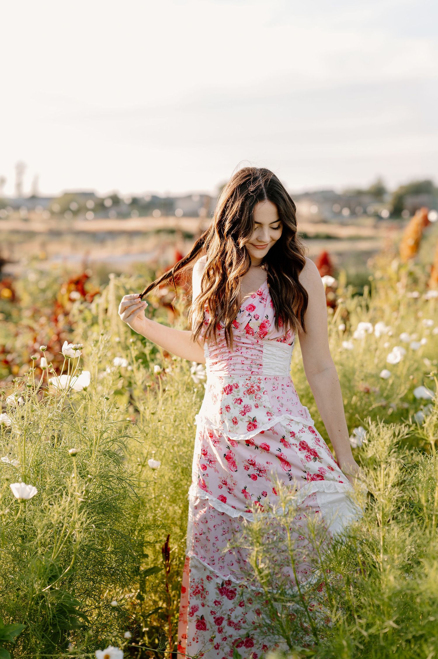 2026 senior stands in wildflowers at Haven Flower Farm in Tri-Cities, WA