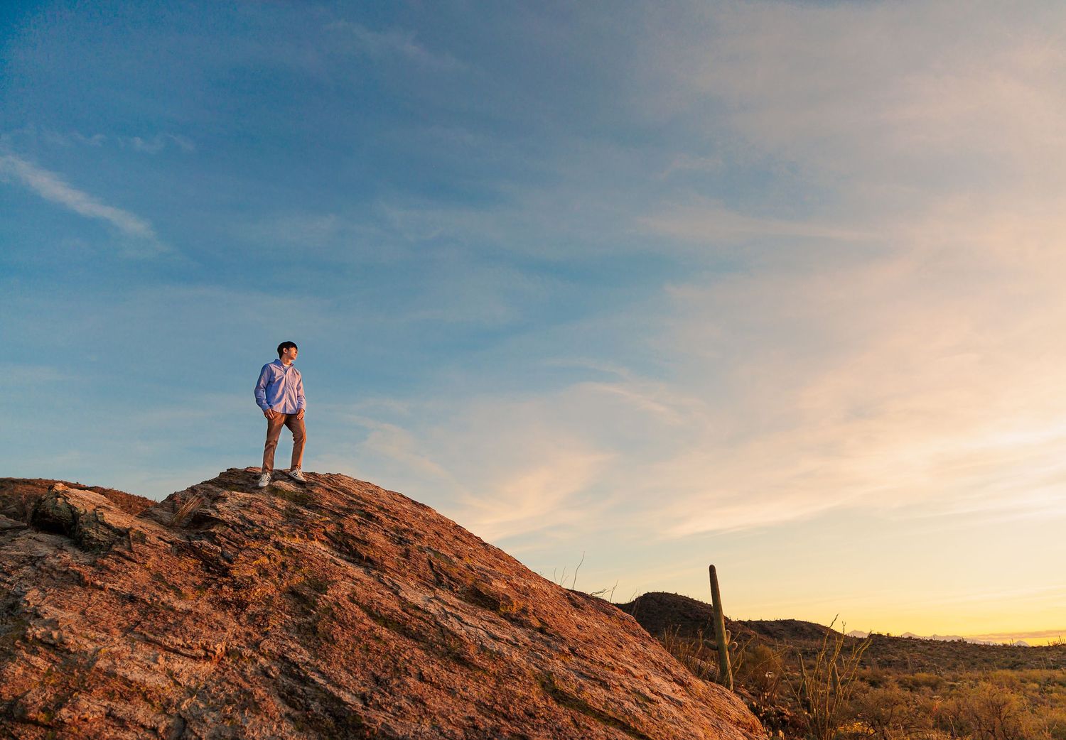 senior guy on a mountain overlooking the desert tucson, Az