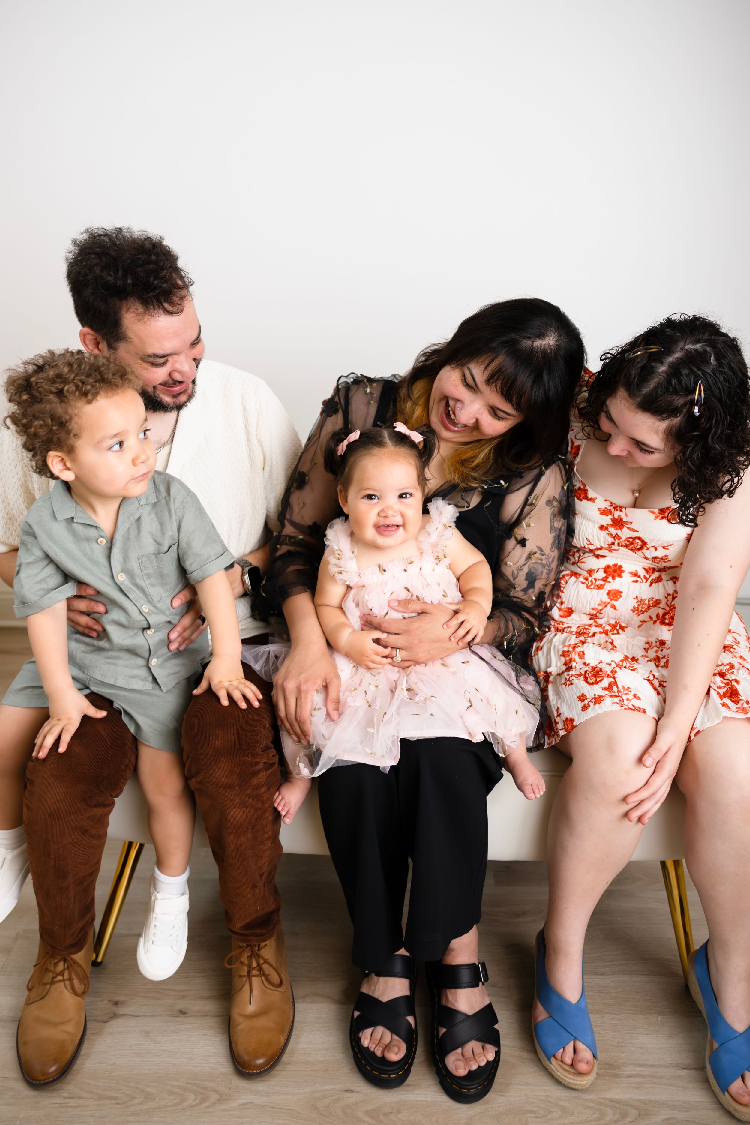 Happy family of five sitting together. NJ family photographer