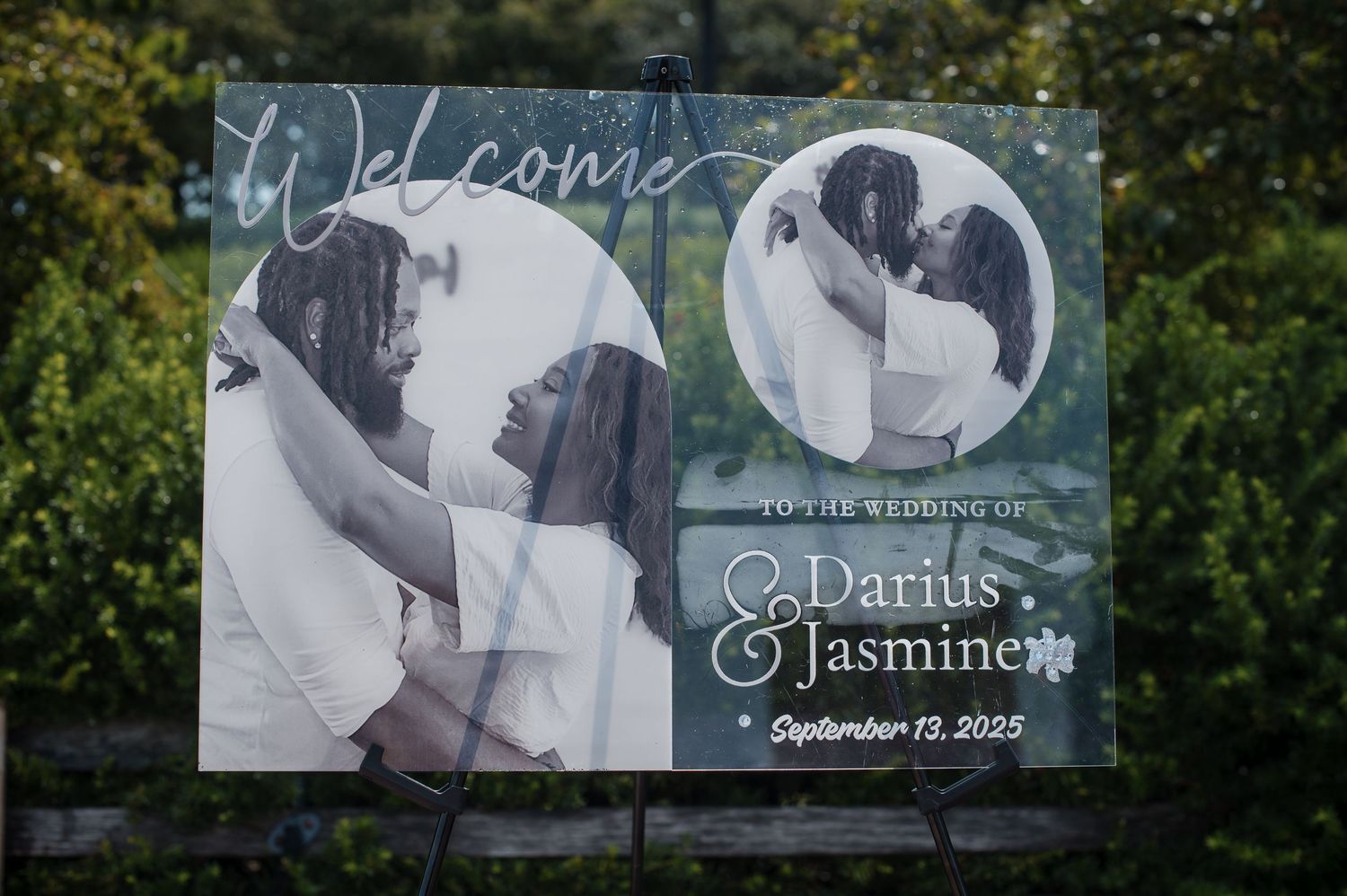 Welcome sign for the wedding of Darius and Jasmine on September 13, 2025, featuring couple photos.