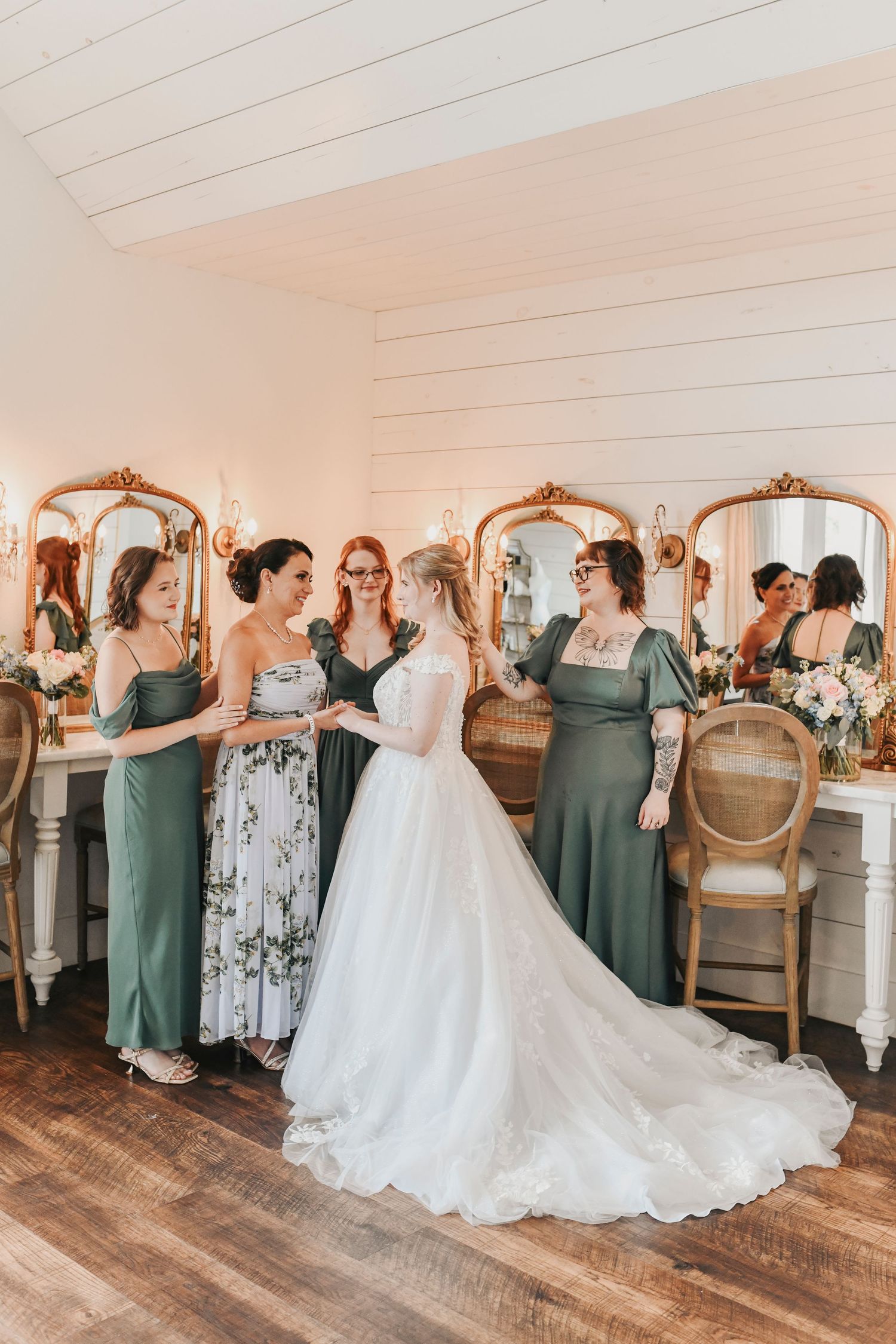 Kathryn getting ready for her romantic pastel wedding at The French Farmhouse
