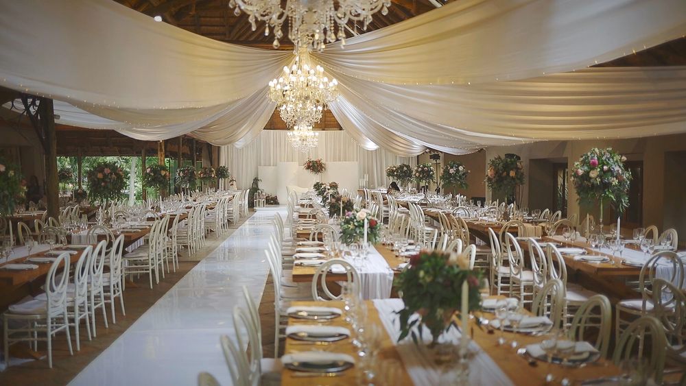 Luxury ballroom decorated for an elegant wedding reception.