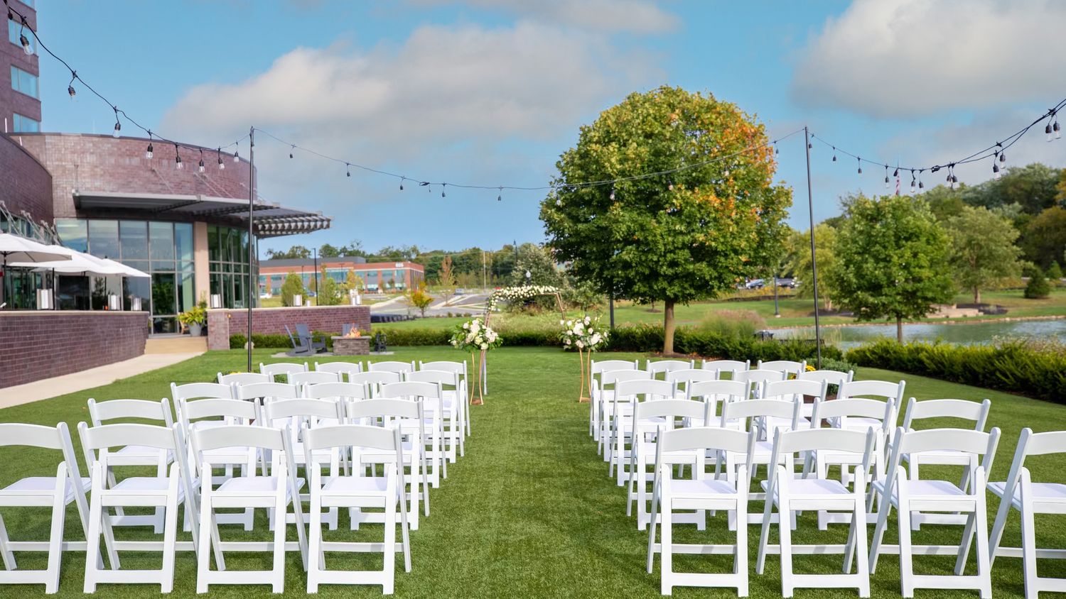 Outdoor wedding ceremony setup at renaissance outdoor wedding venue.