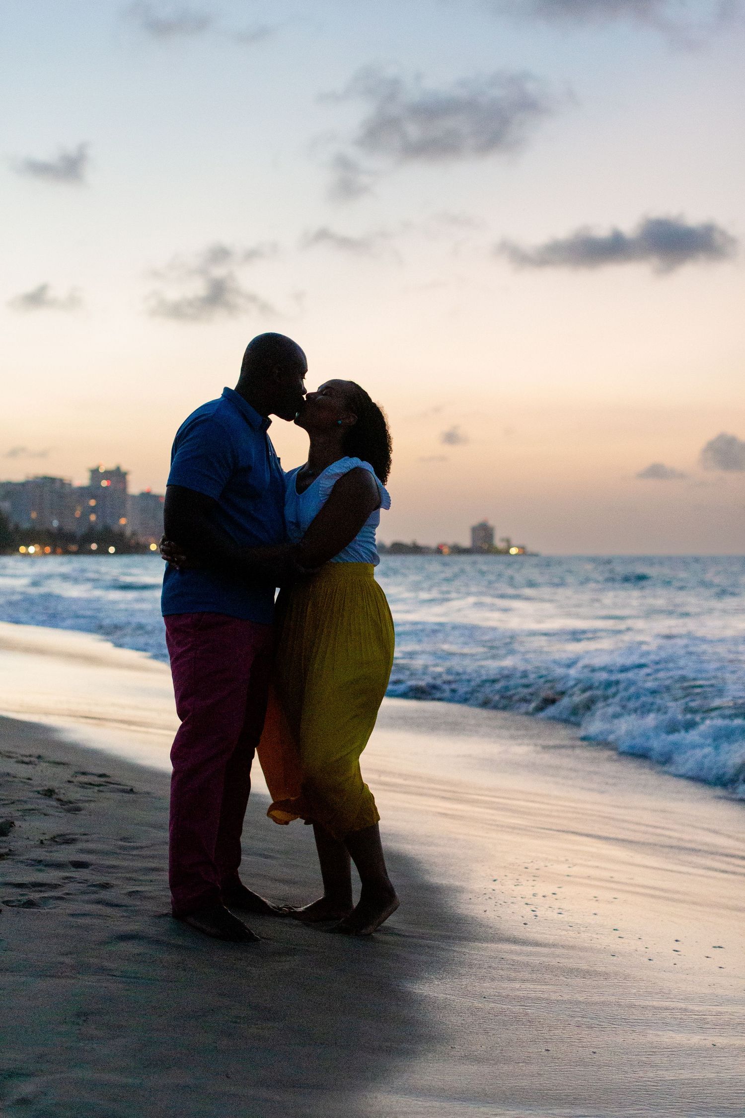 Couples portrait. Silhouette on the beach in Isla Verde, Carolina, Puerto Rico.