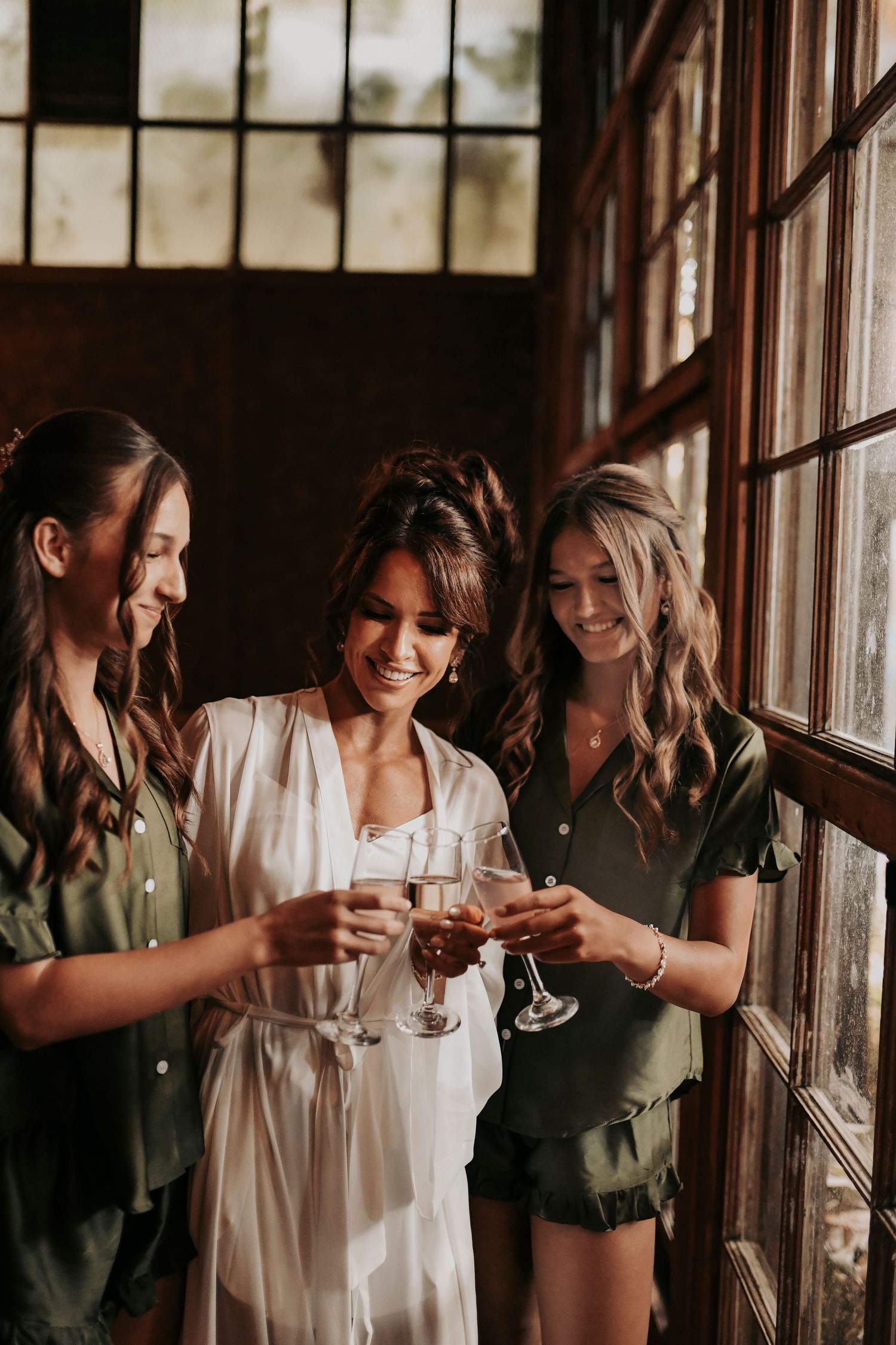 Bride and family wearing matching pajamas before the wedding