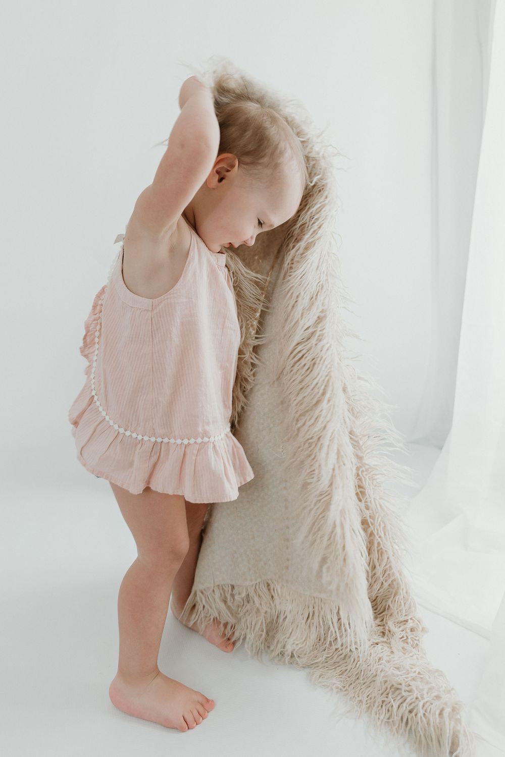 Child's play personality shots during 2 year old milestone session in Tyler Tx by Motherhood Photographer KP Portraits