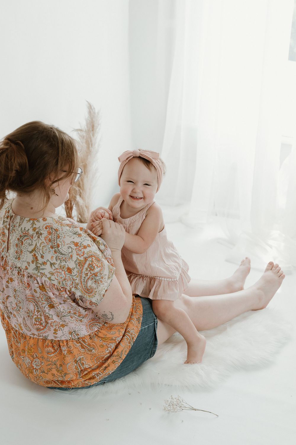 Mom and Toddler playing during 2 year old milestone studio session in Tyler, Texas