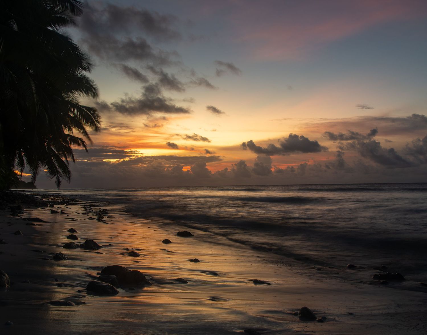 A beautiful sunset photo taken by Paul Block of No Planet B Photography on an island in the British Indian Ocean.